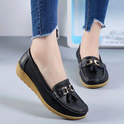 Comfort Slip-Ons with Tassel Detail and Low Wedge Heel