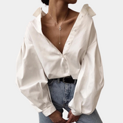 Women's Oversized Blouse with Deep V-Neck and Statement Sleeves