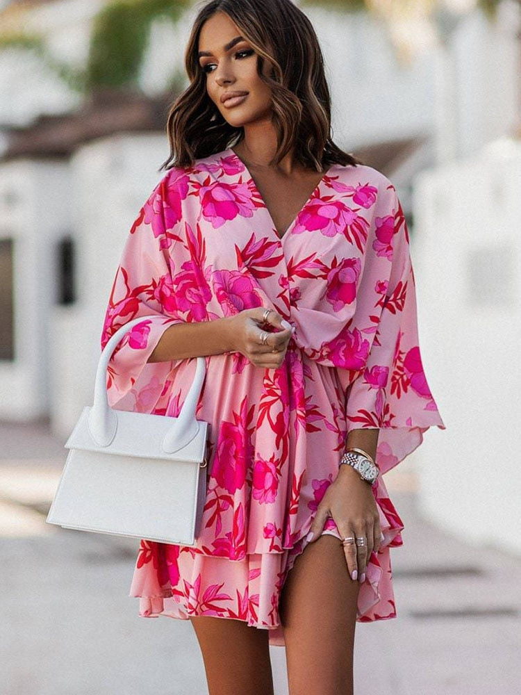 Joyce - Flowy Mini Dress with a Summery Flair