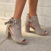 Peep-toe ankle boots with bow detail and block heel