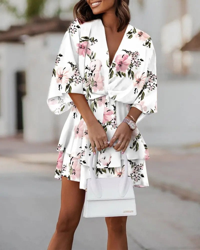 Joyce - Flowy Mini Dress with a Summery Flair