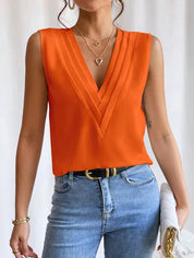 Elegant Sleeveless Blouse with Deep V Neck and Pleated Detail