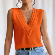 Elegant Sleeveless Blouse with Deep V Neck and Pleated Detail