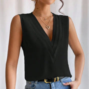 Elegant Sleeveless Blouse with Deep V Neck and Pleated Detail