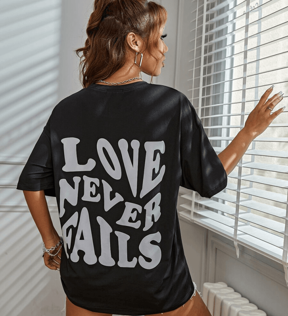 Trendy Oversized Women's Black T-Shirt with Statement Print